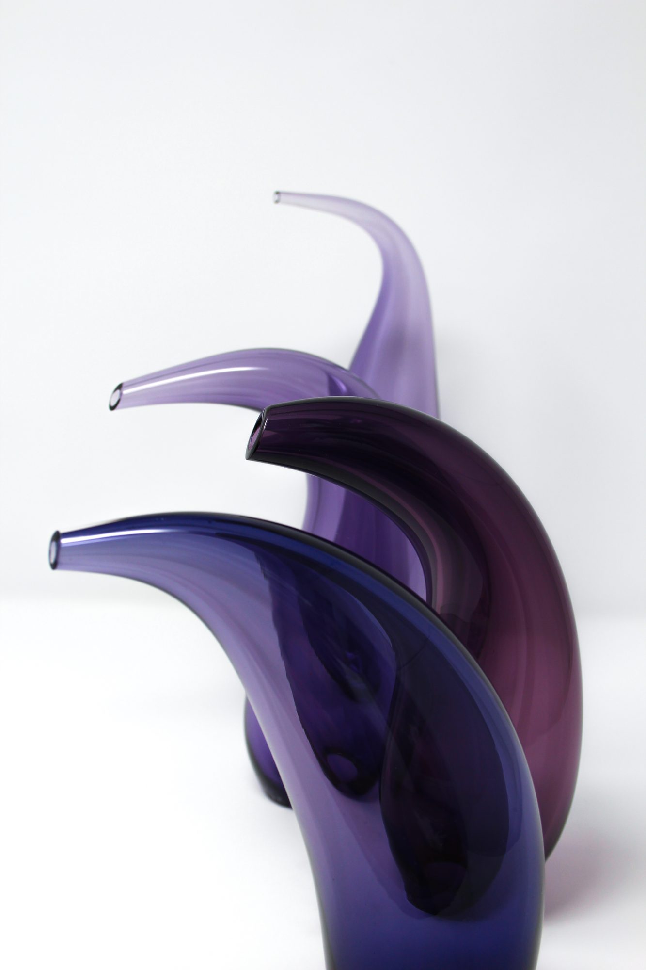 Fluidity — blown glass forms in shades of purple