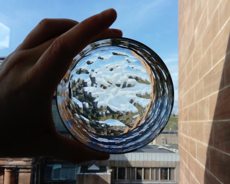 Close view through the cut crystal, the view broken into facets