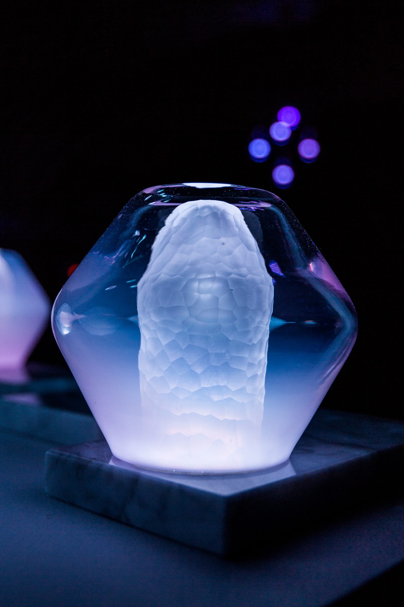 Jewel Lamp — illuminated faceted glass form on a marble base